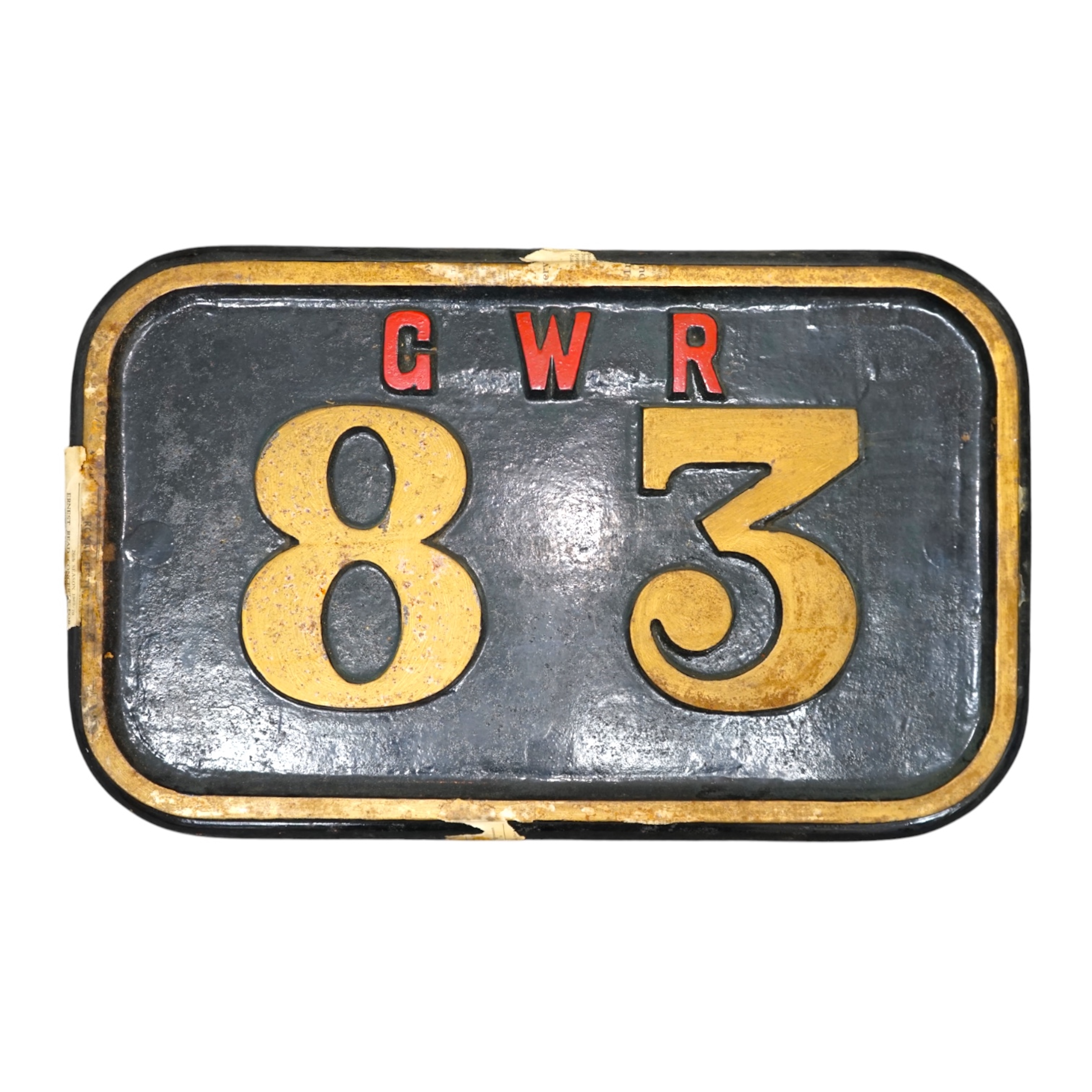 A cast iron GWR locomotive cab side number plate for a P Class 0-6-2T locomotive, 83, built in 1909 by Robert Stephenson and Company for the Rhymney Railway, dimensions; 47.5cm x 29.5cm. Condition - fair to good, general